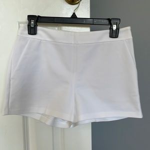 Express white mid rise size 4 shorts. Like new condition
